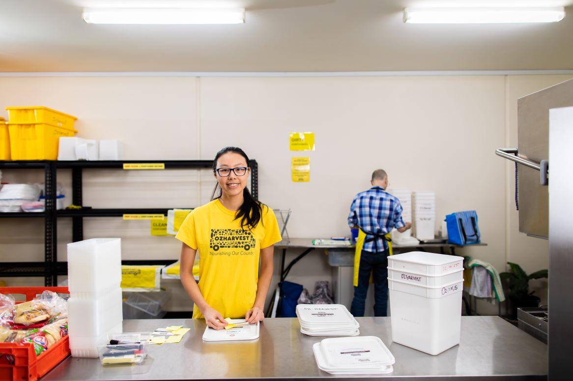 A woman volunteers at Ozharvest